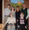 Bob, Nelda, Robbi, Becca, Katie Van Schoick with fiancee Kyle and service dog Kringle